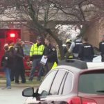 A teenager kills 2 people in a shooting at a Christian school in the US