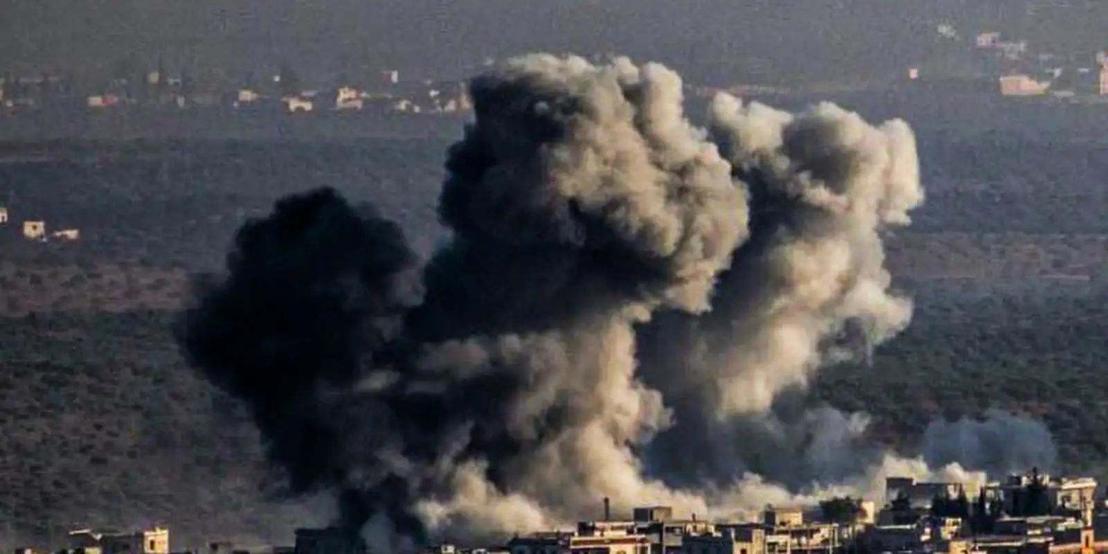 Rebels seize Syria's second largest city in offensive against Assad