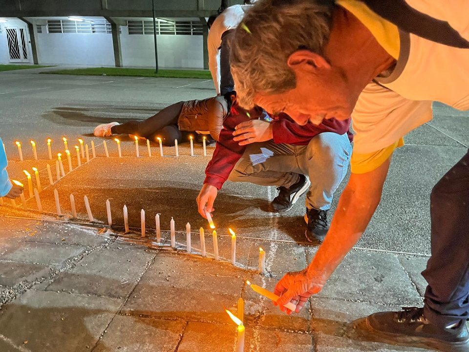 Relatives paid tribute to the three political prisoners who died in prison during a vigil