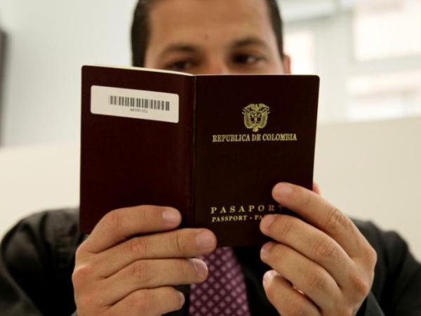 What is needed to get a Colombian passport for the first time?