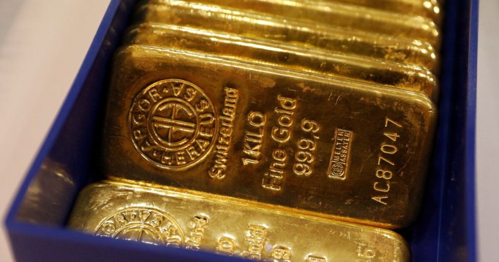 Gold rises to more than two-week highs on safe haven demand