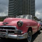 Classic and Tropicana cars make a dumbbell to lift tourism