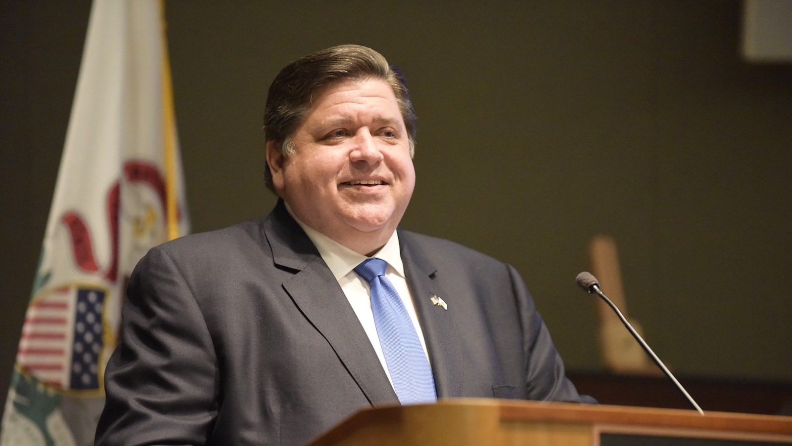 "I do not invoke the Nazi spectrum lightly," says Illinois governor