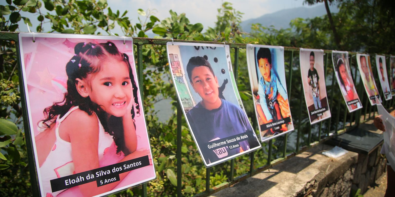 Memorial in Rio has photos of children victims of stray bullet