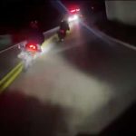 Motorcyclist lost control in a curve and crashed head -on against ambulance after performing dangerous maneuver