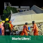 Rescuers work to release workers in collapse in La Romana