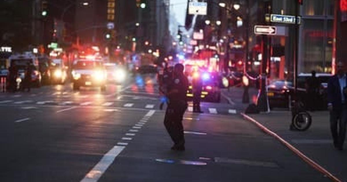At least four dead, including a police officer, in a shooting in New York