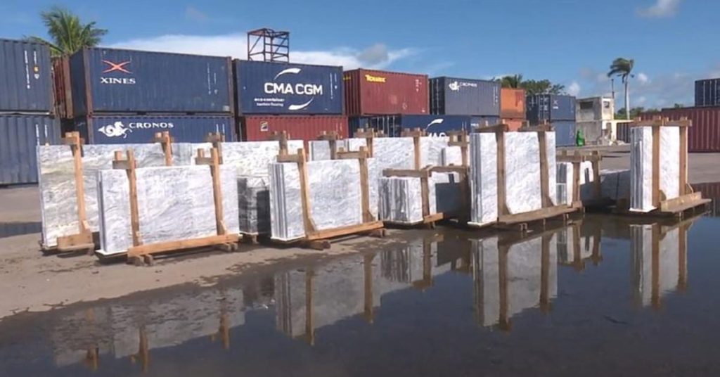 Abandoned marble tons in the port of the island of Youth