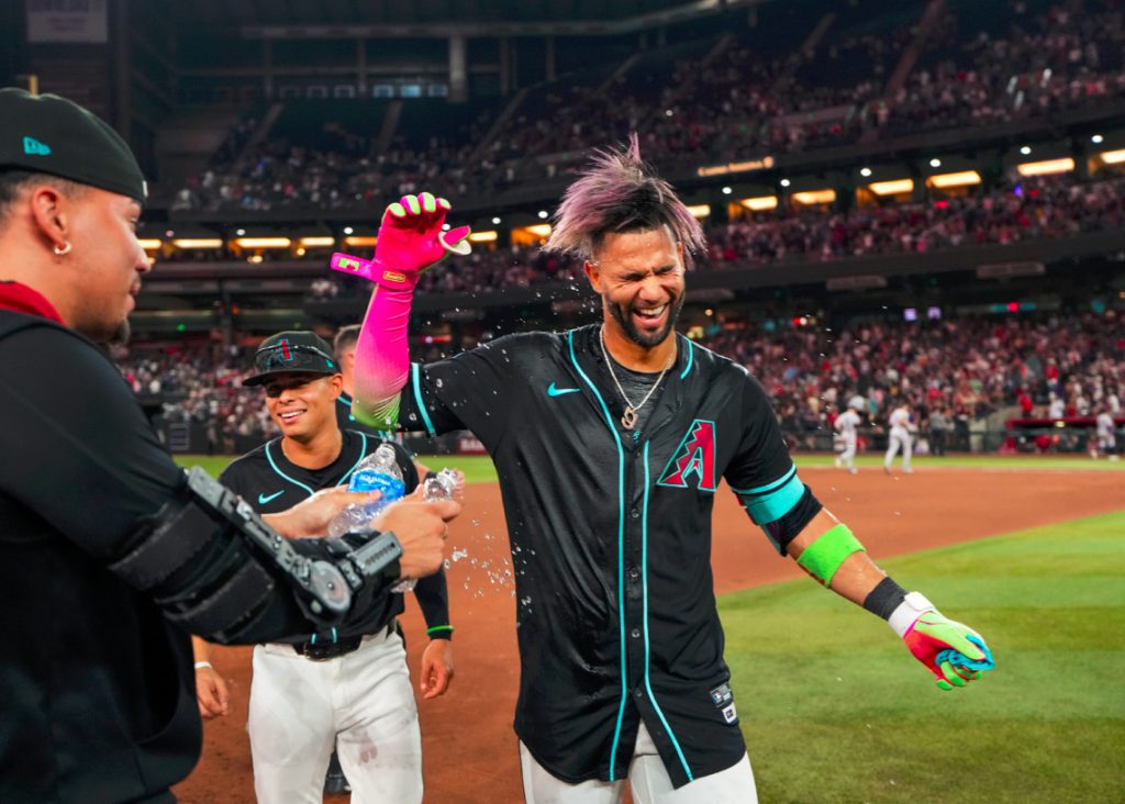 Lourdes Gurriel Jr. wears his father's hero suit