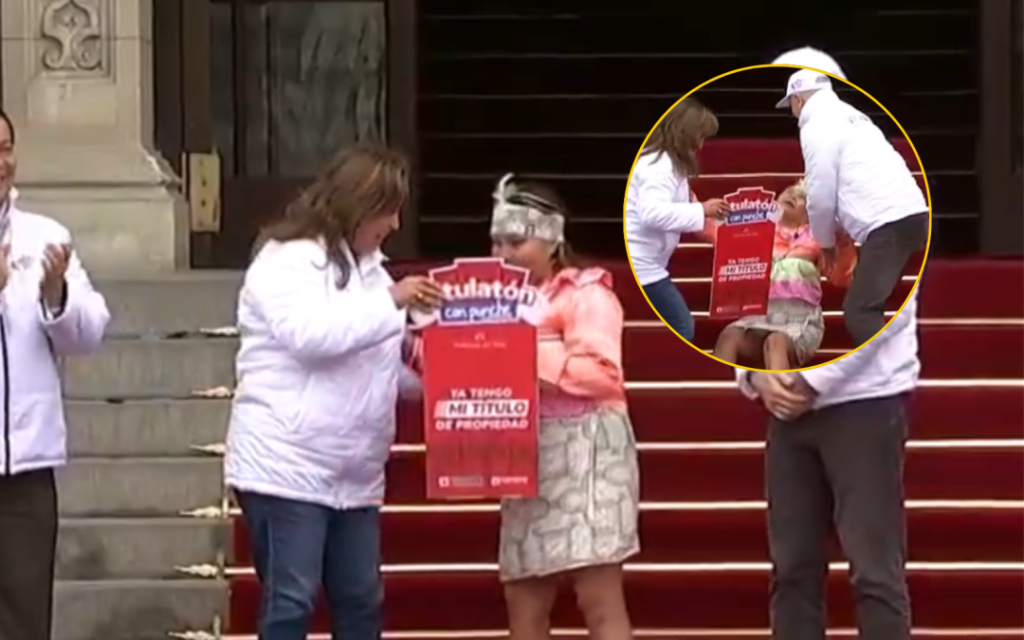 Woman passed out after receiving a title owned by Dina Boluarte