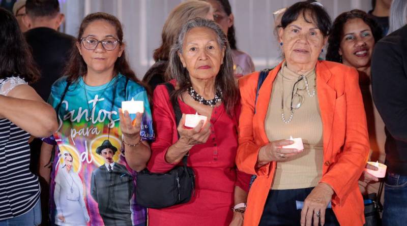 Parishioner marches to honor the first two Venezuelan saints