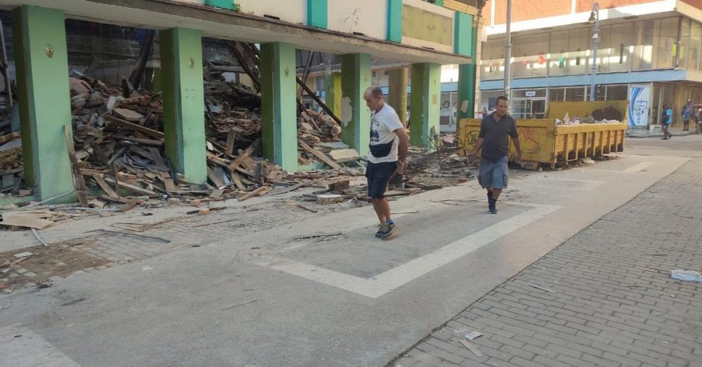 Scavengers prey on the ruins of Café Boulevard in Havana