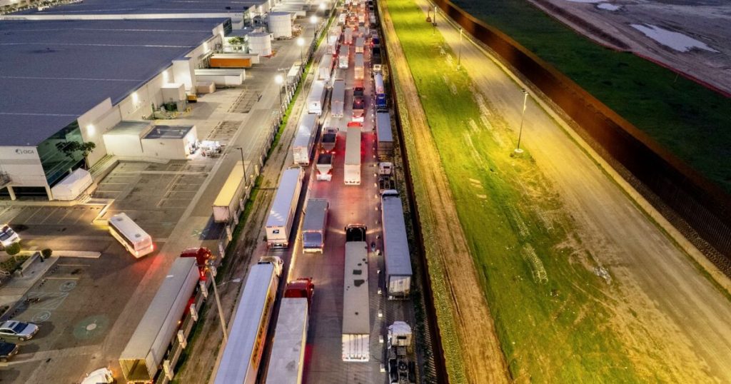 Trump signs executive order on new tariffs on imported trucks and buses