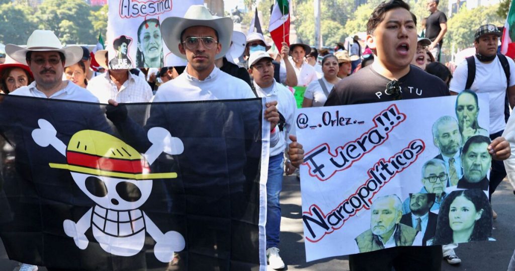 Contingents of the Generation Z march arrive at the Zócalo and tear down fences