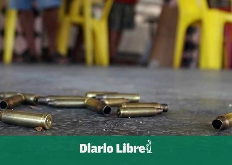 Security guard shot dead during assault on courier in Santiago