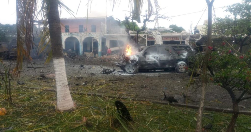 A car bomb explodes in front of the community police in Coahuayana, Michoacán