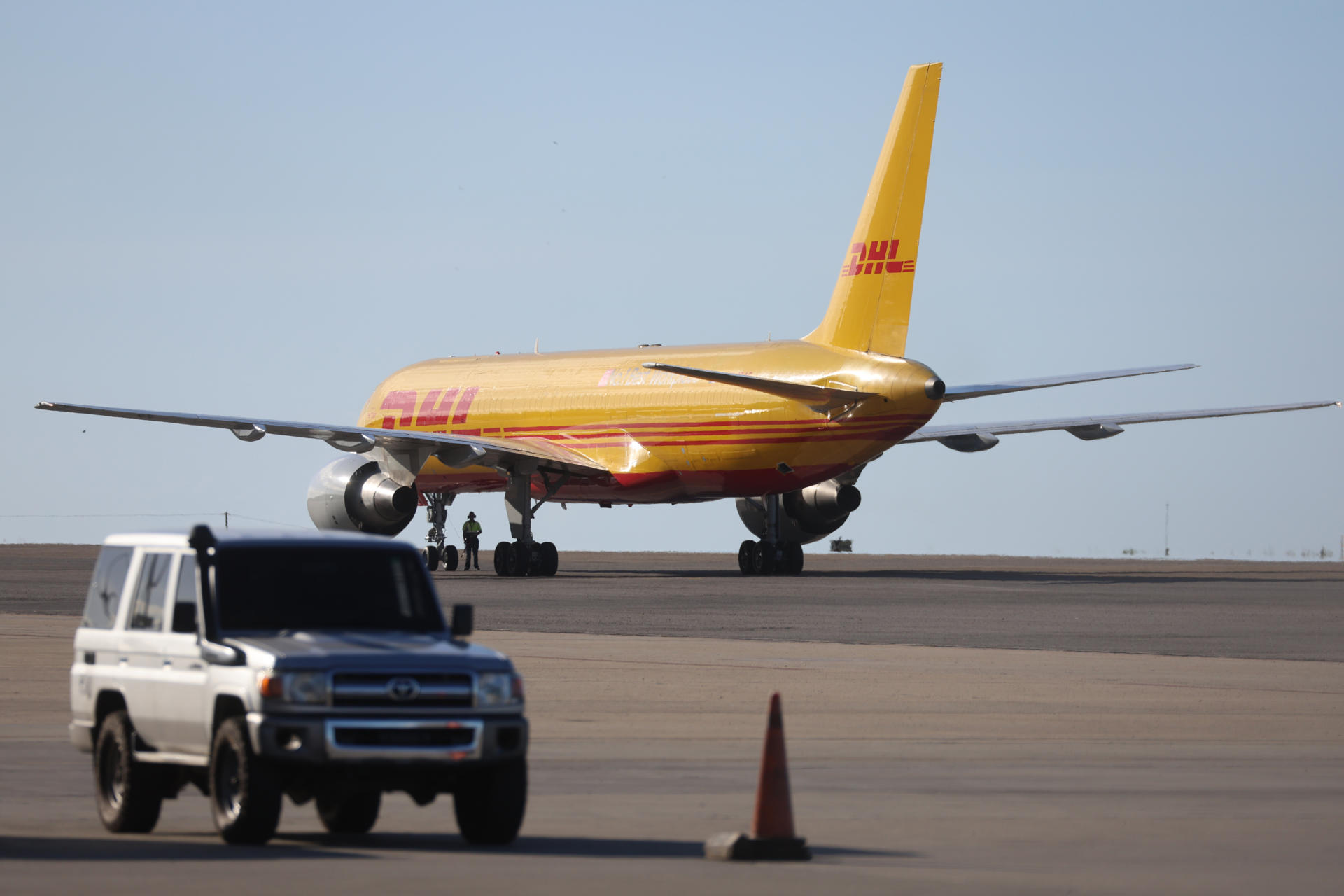 A flight of migrants from the US lands in Venezuela amid tensions over airspace