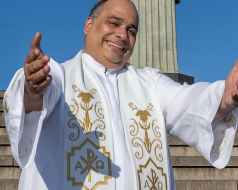 Father Omar, rector of the Cristo Redentor Sanctuary, performs in Lagoa