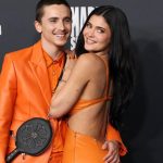 Kylie Jenner and Timothée Chalamet dazzle in vibrant orange on the 'Marty Supreme' carpet