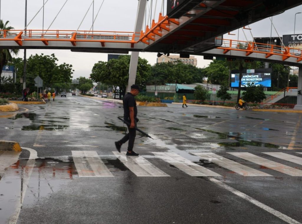 Passing rains this Sunday due to a weak trough