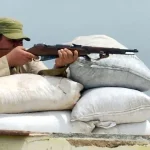 Participante en un "Día de la Defensa" convocado por el régimen