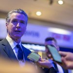 California governor uses Davos as springboard to confront Trump