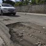 Holes and stagnant water destroy vehicles in La Avanzada