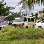 Scrap metal occupies a green area at the head of the 17th bridge
