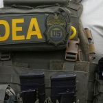 What charges does Meliton Cordero, a DEA agent detained in the DR, face?