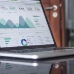 Laptop displaying data analytics dashboard