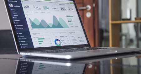 Laptop displaying data analytics dashboard