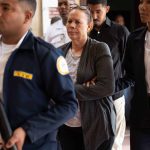 Court discharges woman accused of paying to have her husband killed