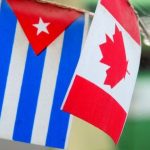 Banderas de Cuba y Canadá